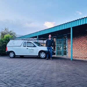 Man standing next to service vehicle outside the Maxiflex Pretoria Branch